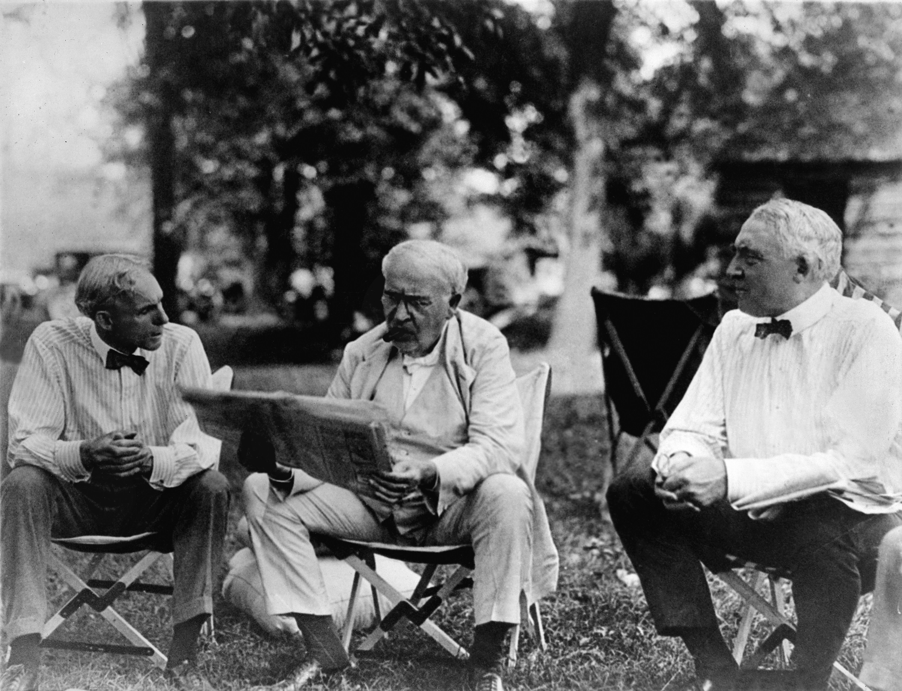 Henry Ford, Thomas Edison and President Warren Harding at camp, 1921